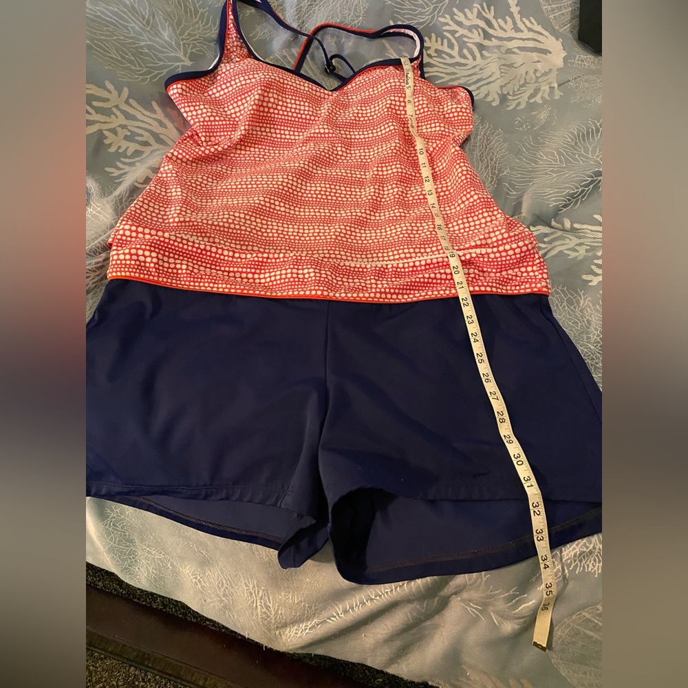 Two piece woman’s bathing suit by south point size 20w in orange and navy blue